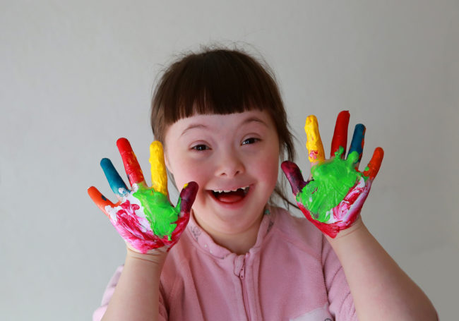 Cute,Little,Girl,With,Painted,Hands.,Isolated,On,Grey,Background.